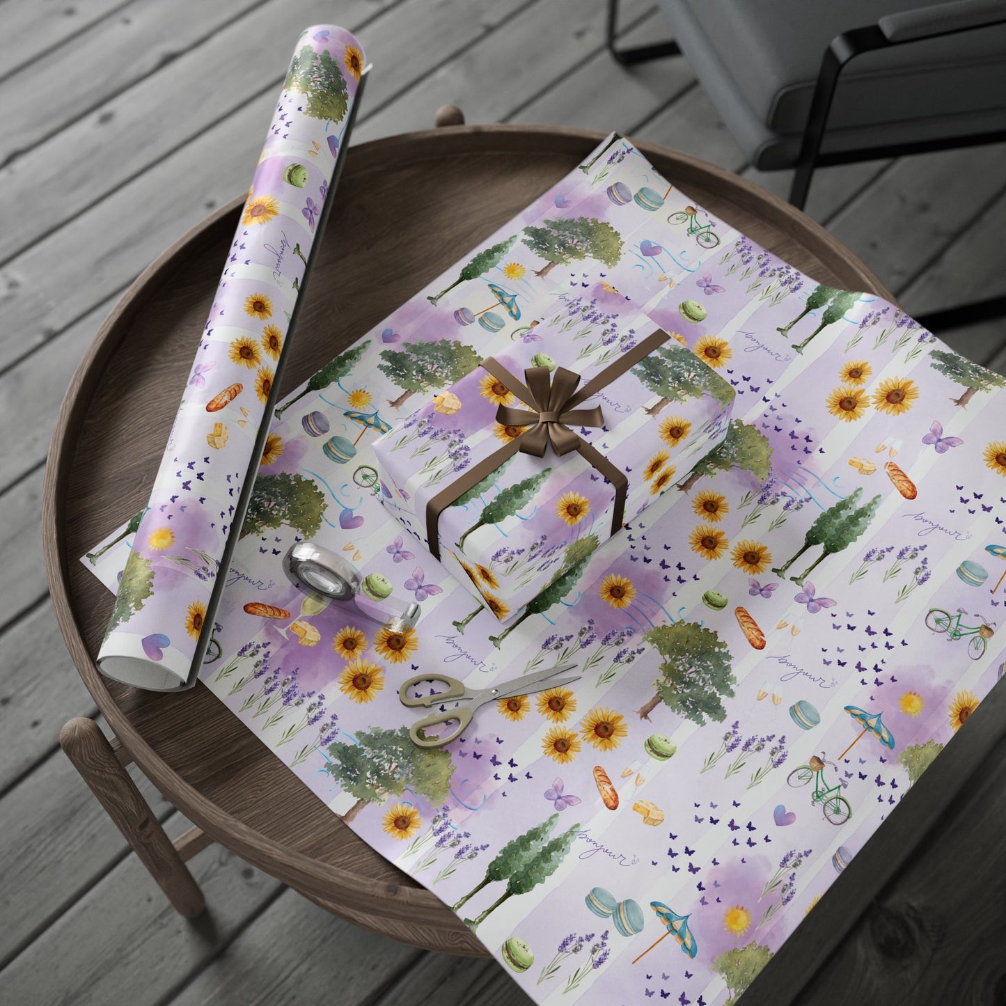 Gift wrap with Provnece-themed design on a wooden table