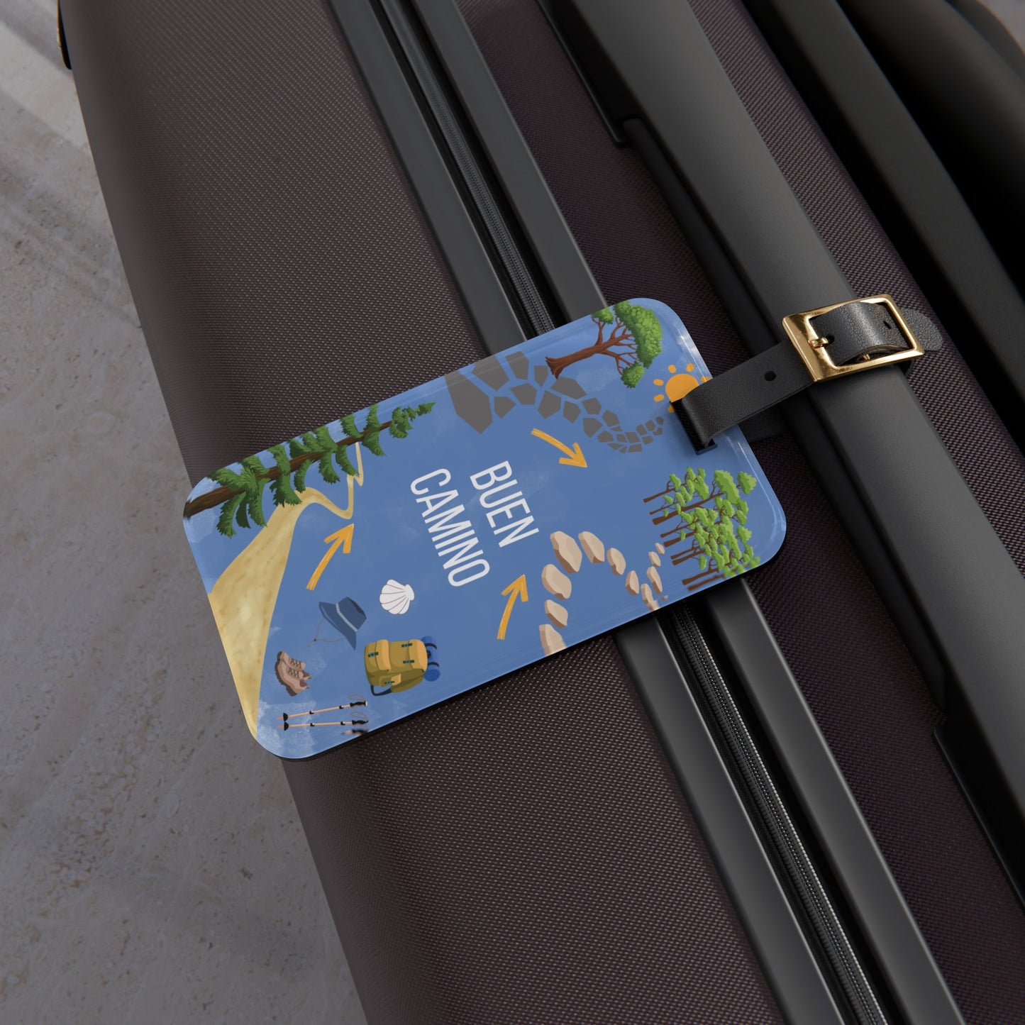 Luggage tag with travel-themed design attached to a suitcase
