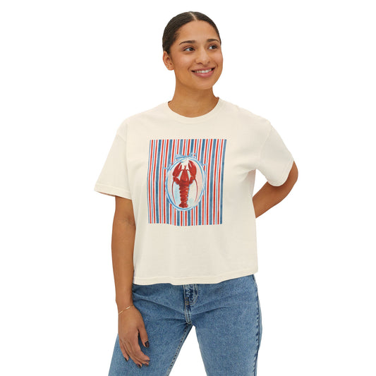 Woman wearing a white t-shirt with a graphic design of a lobster on a white background